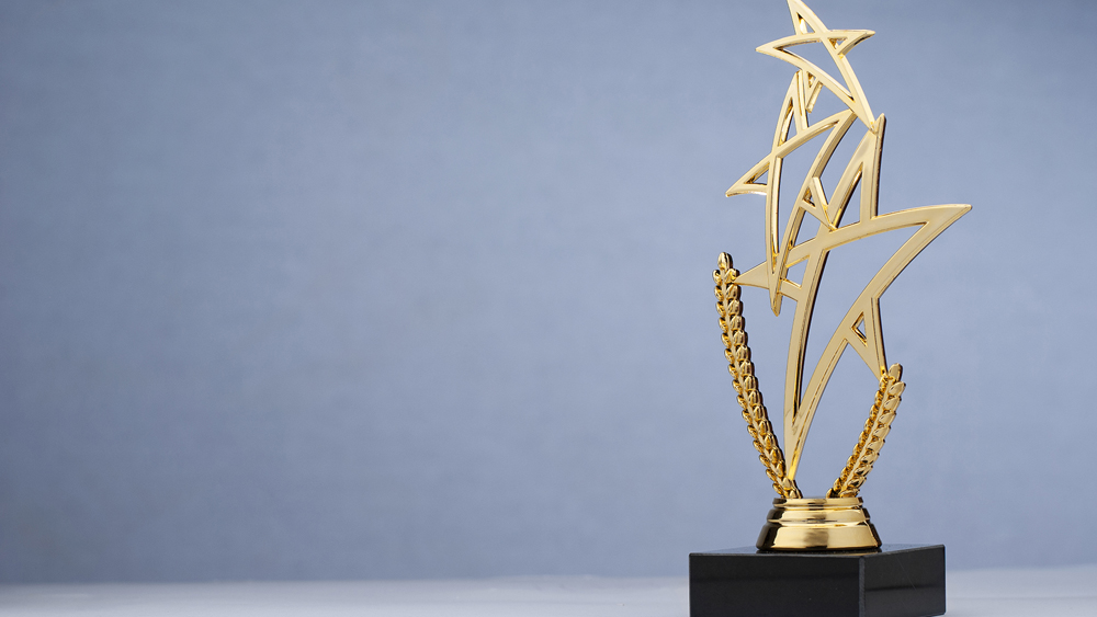 Golden triple tar shaped trophy for rewarding